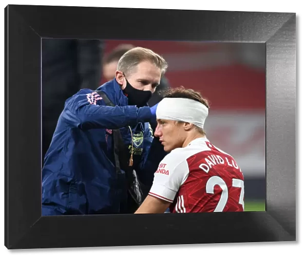 Arsenal's David Luiz Receives Solo Head Injury Treatment in Empty Emirates Stadium (Premier League, 2020-21)
