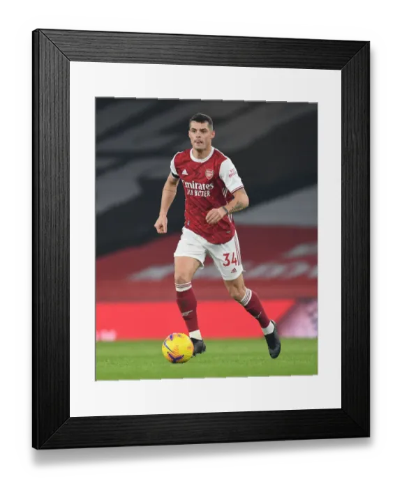 Framed Print : Arsenal's Xhaka in Action: Emirates Stadium Showdown Against Wolverhampton Wanderers (2020-21)
