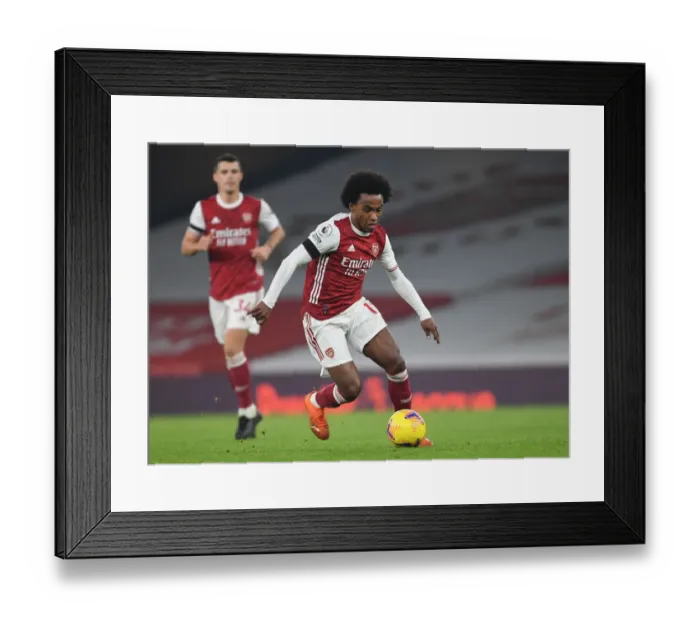 Framed Print : Willian's Brilliant Performance at Empty Emirates: Arsenal vs. Wolverhampton Wanderers Amidst COVID-19 Restrictions