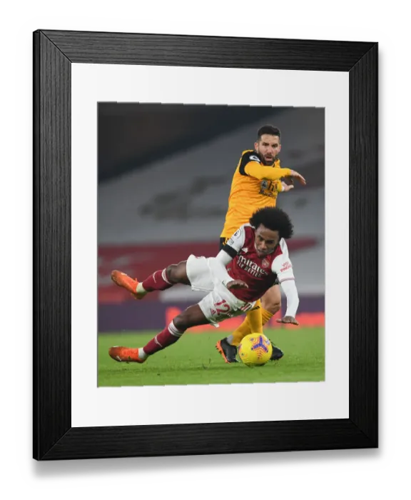 Framed Print : Arsenal vs. Wolverhampton Wanderers: A Battle at Emirates Stadium Amidst the Pandemic (2020-21)