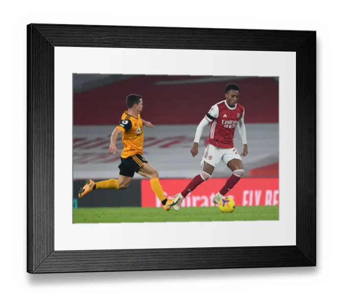 Framed Print : Empty Battle: Arsenal vs. Wolverhampton Wanderers at the Ghostly Emirates Stadium, November 2020