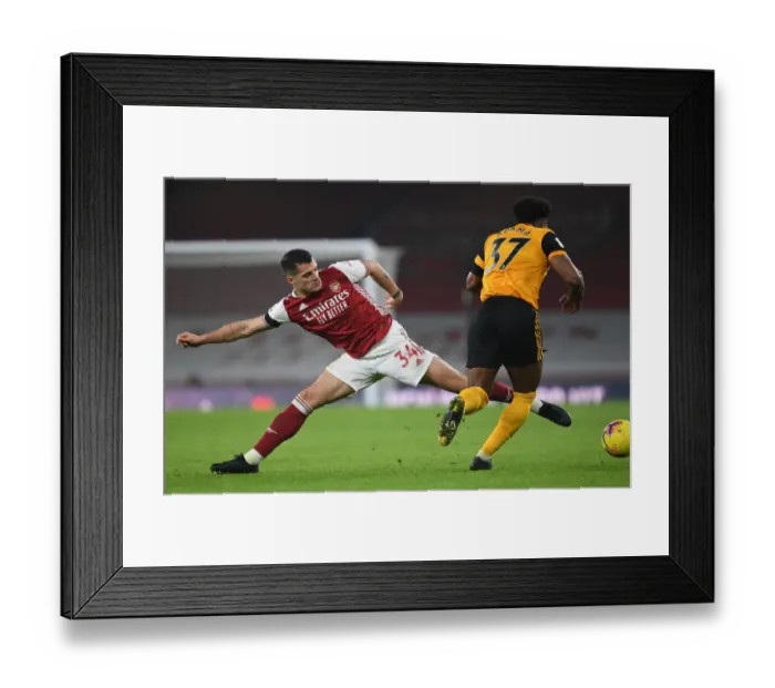 Framed Print : Xhaka vs. Traore: A Battle in Empty Emirates - Arsenal vs. Wolverhampton Wanderers, Premier League 2020-21 Framed Print : Xhaka vs. Traore: A Battle in Empty Emirates - Arsenal vs. Wolverhampton Wanderers, Premier League 2020-21