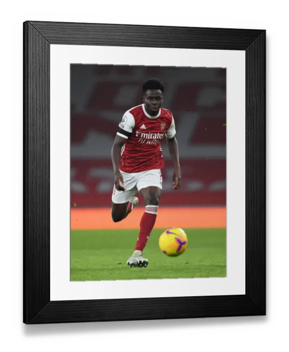 Framed Print : Arsenal's Bukayo Saka in Action against Wolverhampton Wanderers in Emirates Stadium (2020-21)