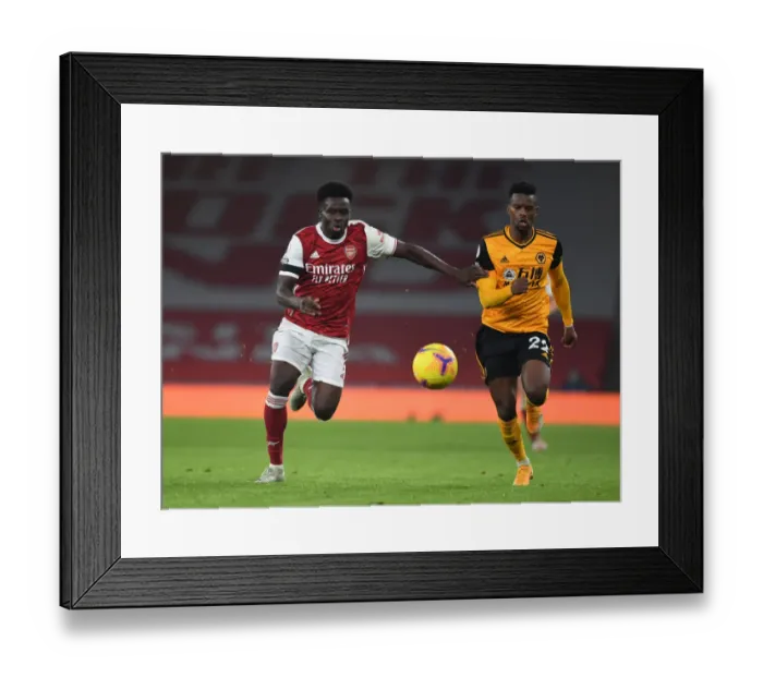 Framed Print : Saka vs. Semedo: A Battle at Empty Emirates - Arsenal vs. Wolverhampton Wanderers (2020-21) Framed Print : Saka vs. Semedo: A Battle at Empty Emirates - Arsenal vs. Wolverhampton Wanderers (2020-21)