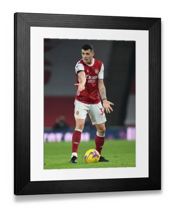 Framed Print : Granit Xhaka in Action: Arsenal vs. Wolverhampton Wanderers (Premier League 2020-21, Emirates Stadium) - Behind Closed Doors