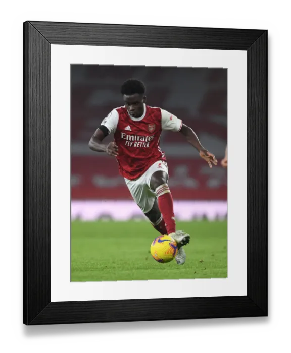 Framed Print : Bukayo Saka in Action: Arsenal vs. Wolverhampton Wanderers (2020-21) - Emirates Stadium
