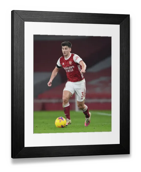 Framed Print : Arsenal's Kieran Tierney in Action against Wolverhampton Wanderers in Emirates Stadium (2020-21)