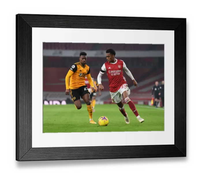 Framed Print : Clash of Titans: Willock vs. Semedo - Arsenal vs. Wolverhampton Wanderers (Premier League 2020-21) - Empty Emirates Stadium Battle