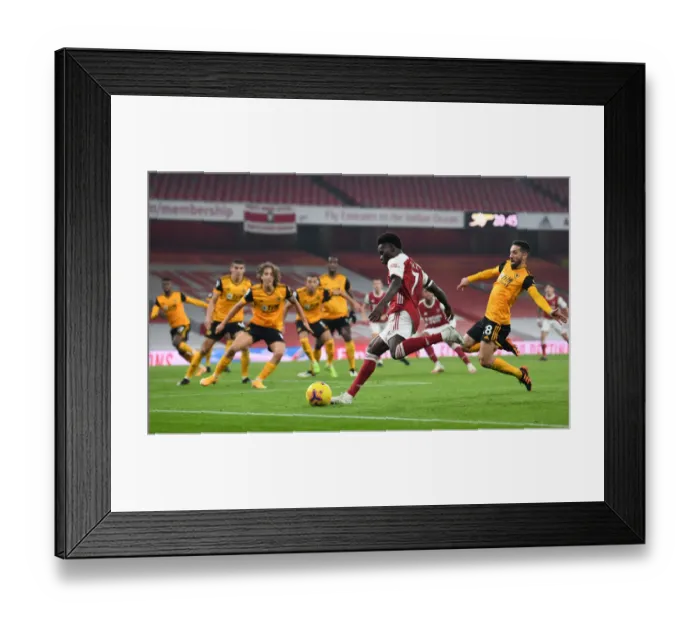 Framed Print : Saka vs. Moutinho: A Premier League Showdown at Emirates Stadium - Arsenal vs. Wolverhampton Wanderers (2020-21) Framed Print : Saka vs. Moutinho: A Premier League Showdown at Emirates Stadium - Arsenal vs. Wolverhampton Wanderers (2020-21)