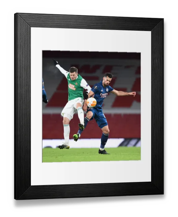 Framed Print : Arsenal vs Rapid Wien: UEFA Europa League Clash at Empty Emirates Stadium (2020-21)