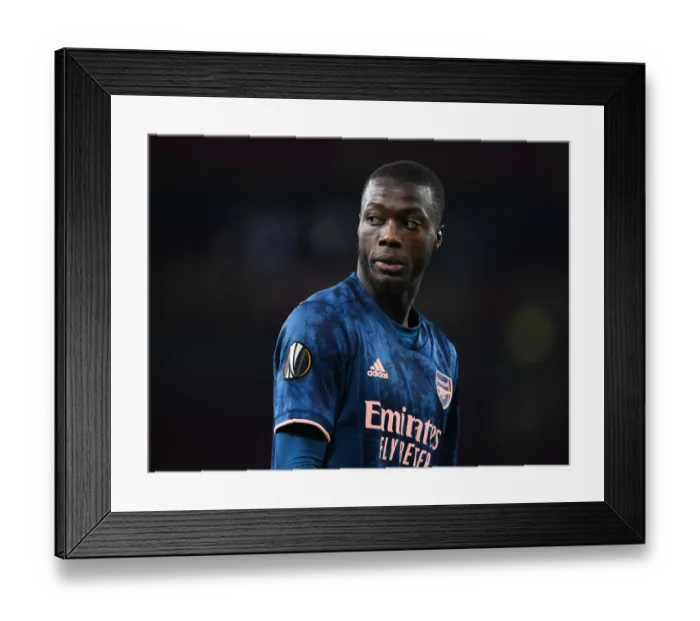 Framed Print : Arsenal's Nicolas Pepe in Action against Rapid Wien in Empty Emirates Stadium - UEFA Europa League 2020-21