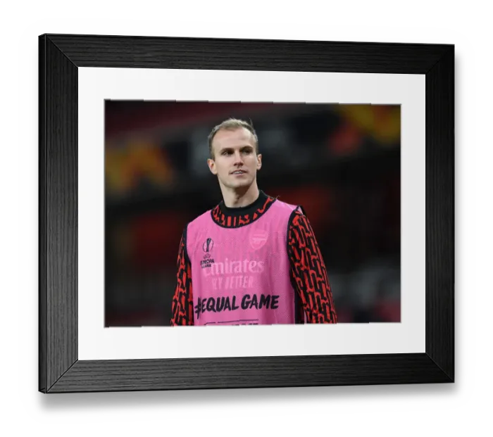 Framed Print : Arsenal's Rob Holding in UEFA Europa League Action Against Rapid Wien (Behind Closed Doors)
