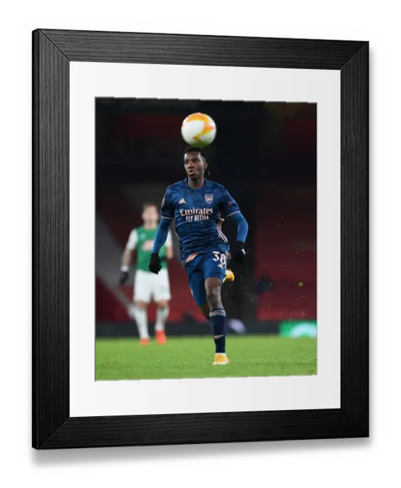 Framed Print : Arsenal's Eddie Nketiah in UEFA Europa League Action Against Rapid Wien (Behind Closed Doors)