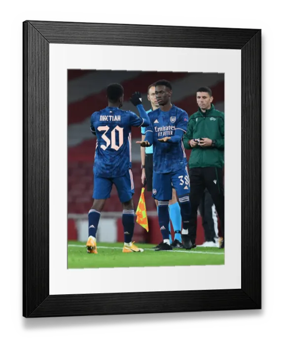 Framed Print : Arsenal Substitutes Flo Balogun On for Nketiah in Empty Emirates Stadium during Arsenal v Rapid Wien UEFA Europa League Match