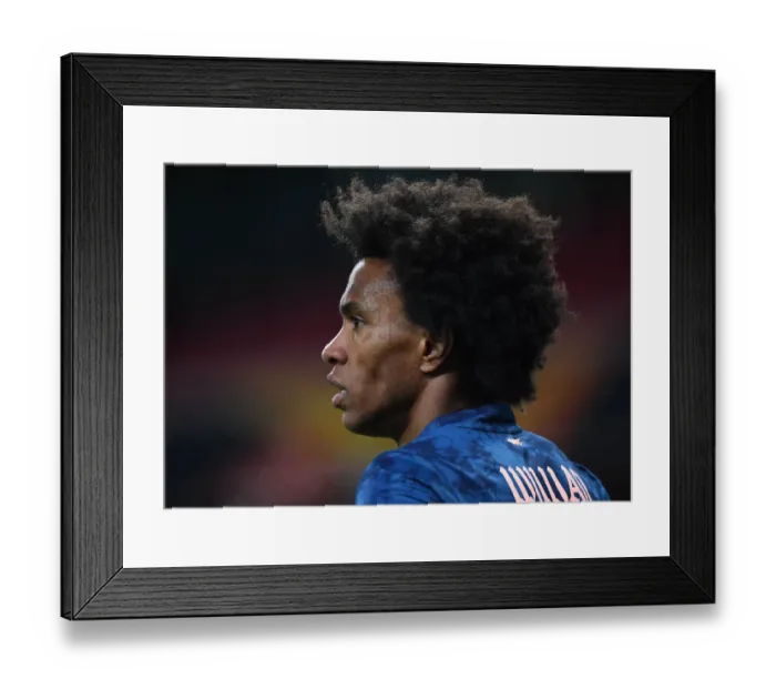 Framed Print : Willian Plays Alone: Arsenal's Empty Emirates Europa League Match vs. Rapid Wien