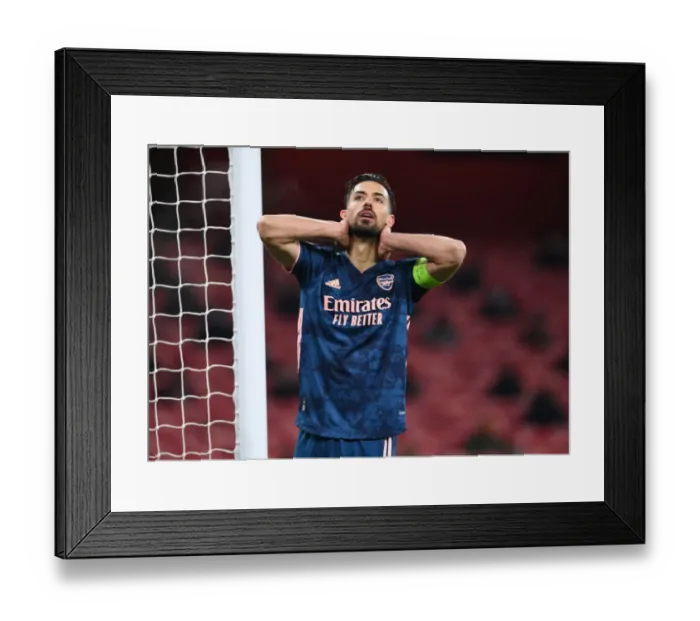 Framed Print : Arsenal's Pablo Mari in Emirates Stadium: A Lone Warrior in the UEFA Europa League Amidst Empty Seats Framed Print : Arsenal's Pablo Mari in Emirates Stadium: A Lone Warrior in the UEFA Europa League Amidst Empty Seats