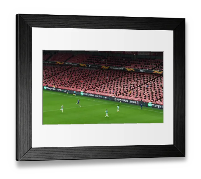 Framed Print : Arsenal's Emirates Stadium: A Ghostly Europa League Showdown Against Rapid Wien (December 2020)