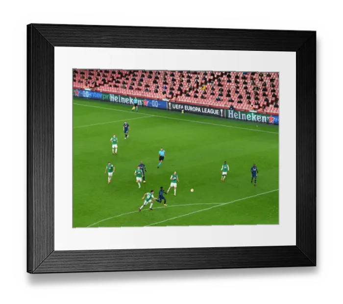 Framed Print : Arsenal's Emirates Stadium: A Ghostly Arena in Europa League Match against Rapid Wien (December 2020) Framed Print : Arsenal's Emirates Stadium: A Ghostly Arena in Europa League Match against Rapid Wien (December 2020)