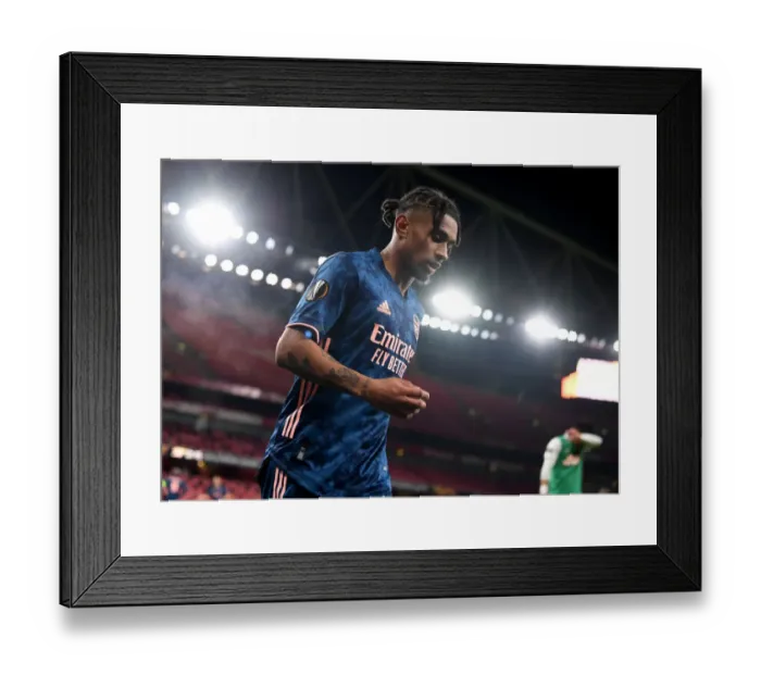 Framed Print : Reiss Nelson Shines in Empty Emirates: Arsenal's 1-0 Victory over Rapid Wien, UEFA Europa League 2020-21