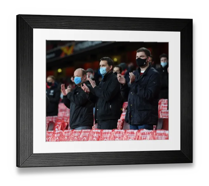 Framed Print : Arsenal Fans in Full Swing: Cheering at Emirates Stadium during Europa League Match (2020-21) Framed Print : Arsenal Fans in Full Swing: Cheering at Emirates Stadium during Europa League Match (2020-21)