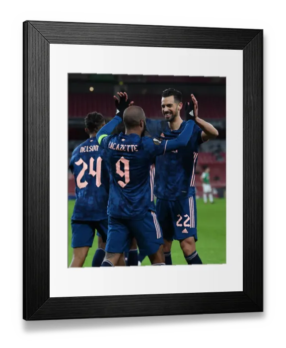 Framed Print : Alexandre Lacazette's Goal: Arsenal FC Takes the Lead Against Rapid Wien in Europa League