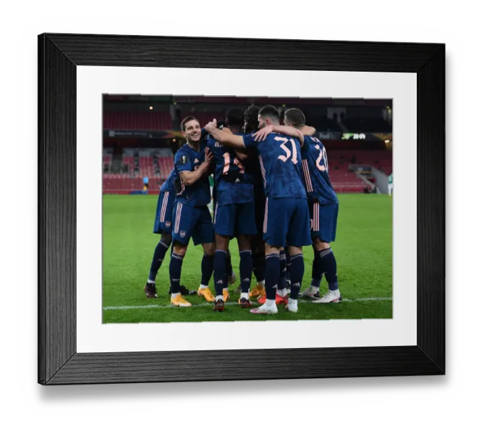 Framed Print : Arsenal Celebrate First Goal Against Rapid Wien in Europa League