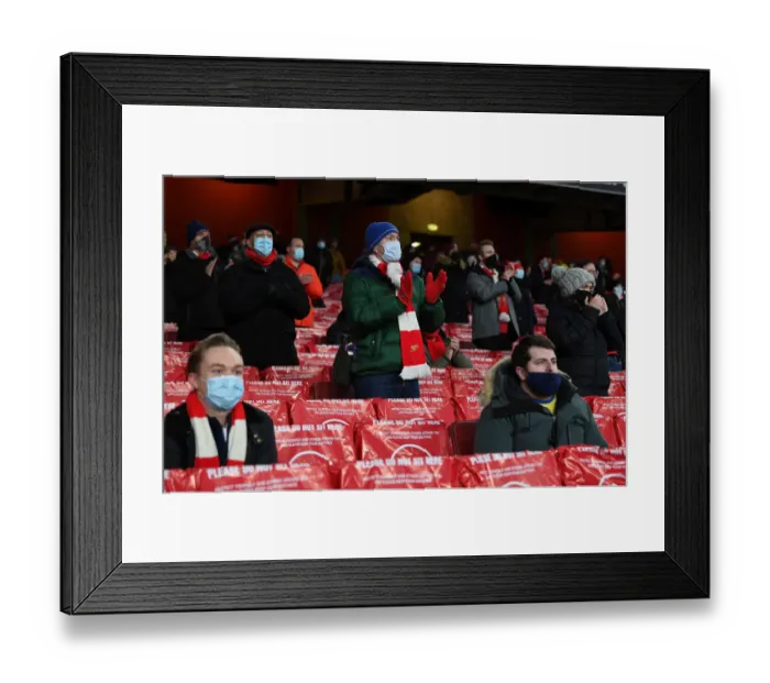 Framed Print : Arsenal Fans in Full Throat: Europa League Cheer at Emirates Stadium Framed Print : Arsenal Fans in Full Throat: Europa League Cheer at Emirates Stadium