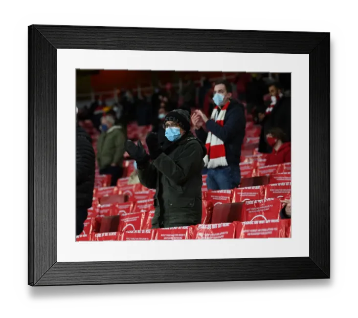 Framed Print : Arsenal Fans Cheer at Emirates Stadium during Arsenal v Rapid Wien UEFA Europa League Match