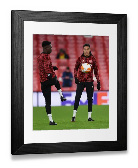 Framed Print : Arsenal FC: Flo Balogun and Miguel Azeez Warm Up Ahead of Arsenal v Rapid Wien UEFA Europa League Clash Framed Print : Arsenal FC: Flo Balogun and Miguel Azeez Warm Up Ahead of Arsenal v Rapid Wien UEFA Europa League Clash