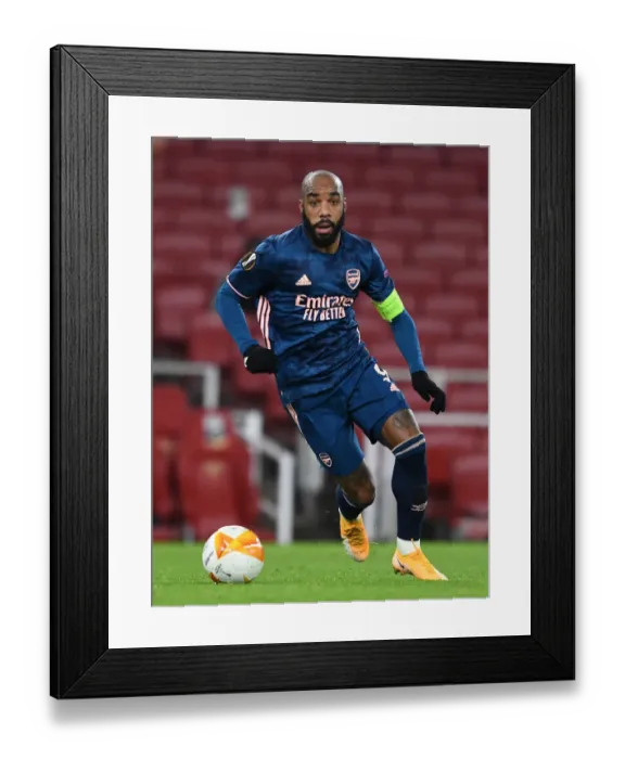 Framed Print : Arsenal's Lacazette in Action against Rapid Wien in Europa League