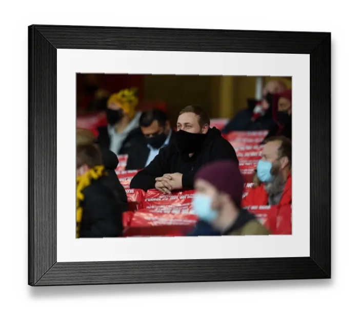 Framed Print : Arsenal Fans in Full Throat: Cheering at Emirates Stadium during Europa League Match