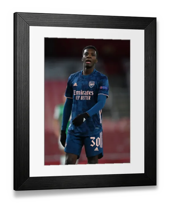 Framed Print : Arsenal's Eddie Nketiah in Action during Europa League Clash against Rapid Wien Framed Print : Arsenal's Eddie Nketiah in Action during Europa League Clash against Rapid Wien