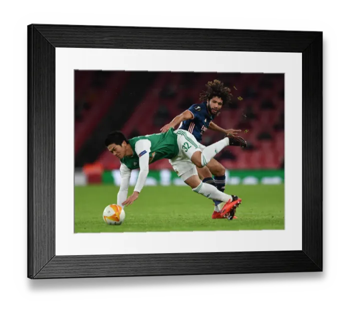 Framed Print : Arsenal's Mohamed Elneny Fouls Kitagawa in Europa League Clash vs Rapid Wien