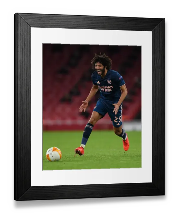 Framed Print : Arsenal's Mohamed Elneny in Action against Rapid Wien in Europa League Group Stage