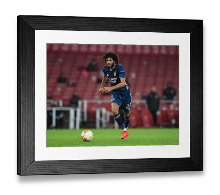 Framed Print : Arsenal's Mohamed Elneny in Action against Rapid Wien in UEFA Europa League