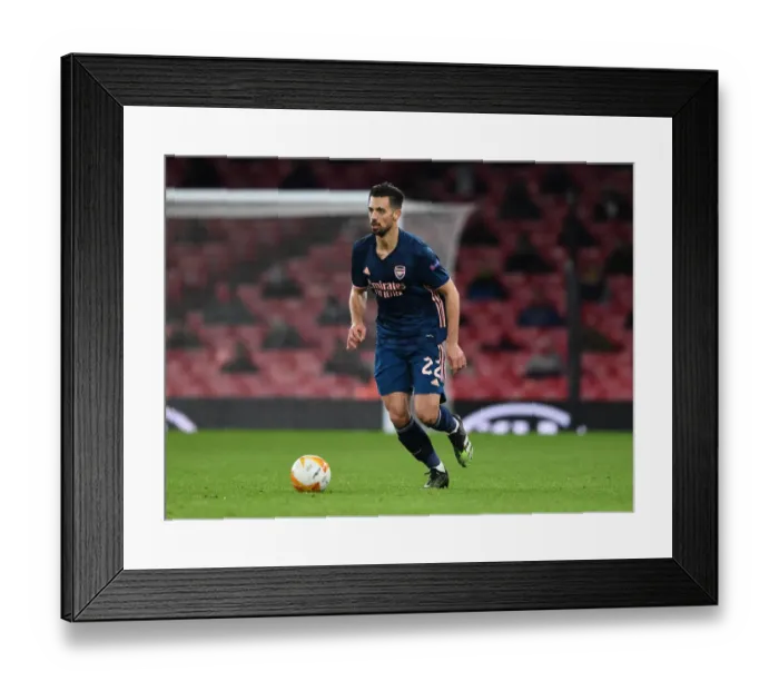 Framed Print : Arsenal's Pablo Mari in Action Against Rapid Wien in UEFA Europa League