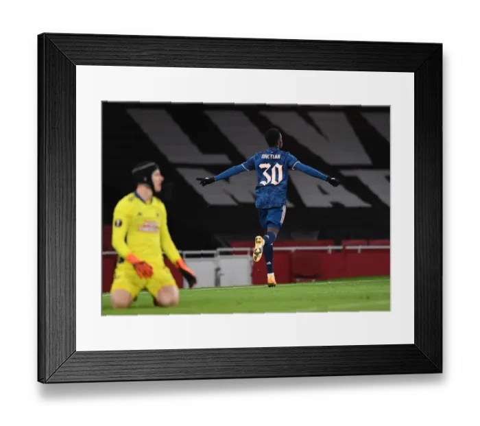 Framed Print : Arsenal's Eddie Nketiah Scores Third Goal vs. Rapid Wien in Europa League