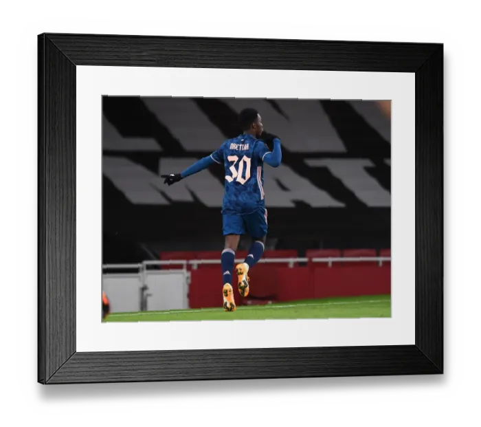 Framed Print : Arsenal's Eddie Nketiah Scores Third Goal in Europa League Victory over Rapid Wien Framed Print : Arsenal's Eddie Nketiah Scores Third Goal in Europa League Victory over Rapid Wien
