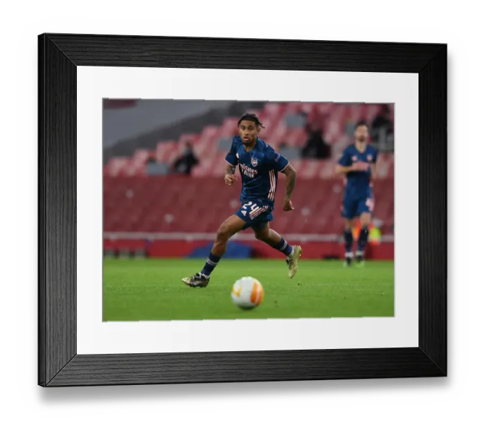 Framed Print : Arsenal's Reiss Nelson Shines in Europa League Clash Against Rapid Wien Framed Print : Arsenal's Reiss Nelson Shines in Europa League Clash Against Rapid Wien
