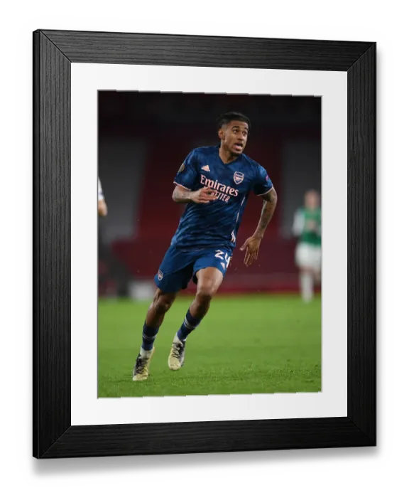 Framed Print : Arsenal's Reiss Nelson Shines: Gunners Dominate Rapid Wien in Europa League