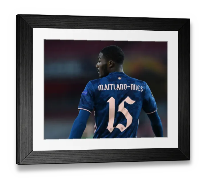 Framed Print : Arsenal's Ainsley Maitland-Niles in Action against Rapid Wien in Europa League