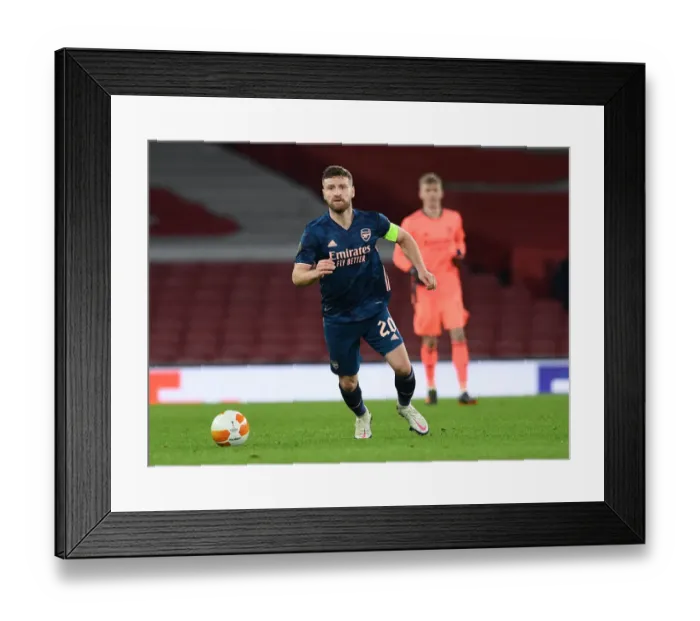 Framed Print : Arsenal's Mustafi in Action against Rapid Wien in UEFA Europa League