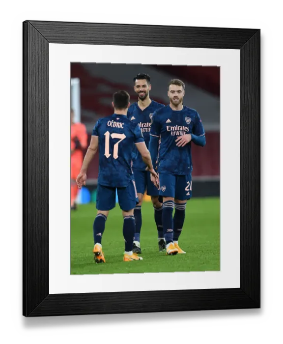 Framed Print : Arsenal FC: Pablo Mari, Calum Chambers, and Cedric Soares Celebrate after UEFA Europa League Victory over Rapid Wien