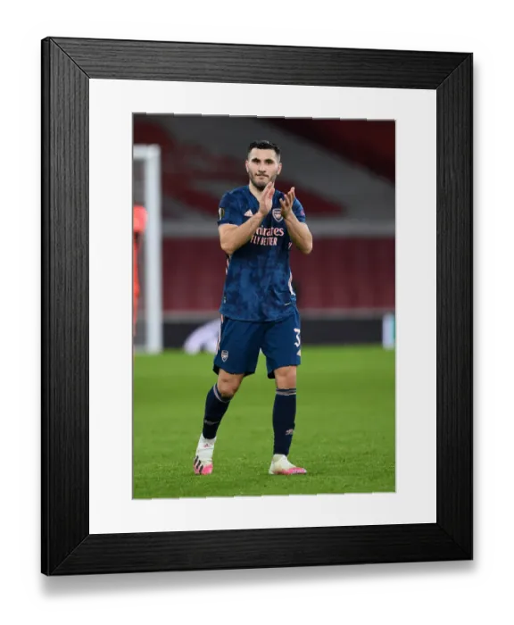Framed Print : Arsenal's Sead Kolasinac Celebrates with Fans after Europa League Victory over Rapid Wien Framed Print : Arsenal's Sead Kolasinac Celebrates with Fans after Europa League Victory over Rapid Wien