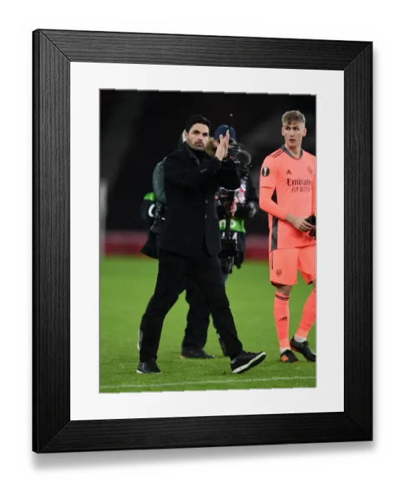 Framed Print : Arsenal Manager Mikel Arteta Celebrates with Fans after Europa League Victory over Rapid Wien Framed Print : Arsenal Manager Mikel Arteta Celebrates with Fans after Europa League Victory over Rapid Wien