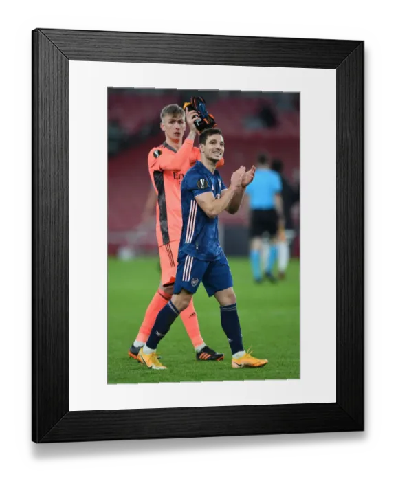 Framed Print : Arsenal's Cedric Soares Celebrates Europa League Victory and Salutes Supporters