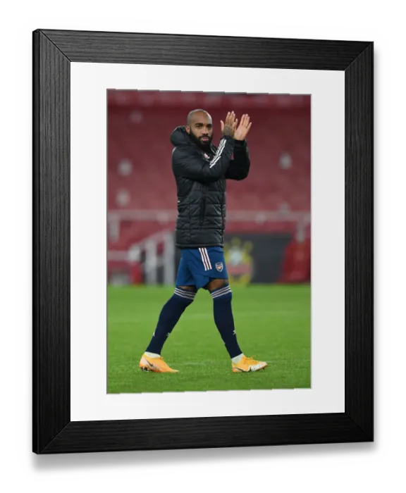 Framed Print : Arsenal's Alexandre Lacazette Celebrates with Fans after Europa League Victory over Rapid Wien