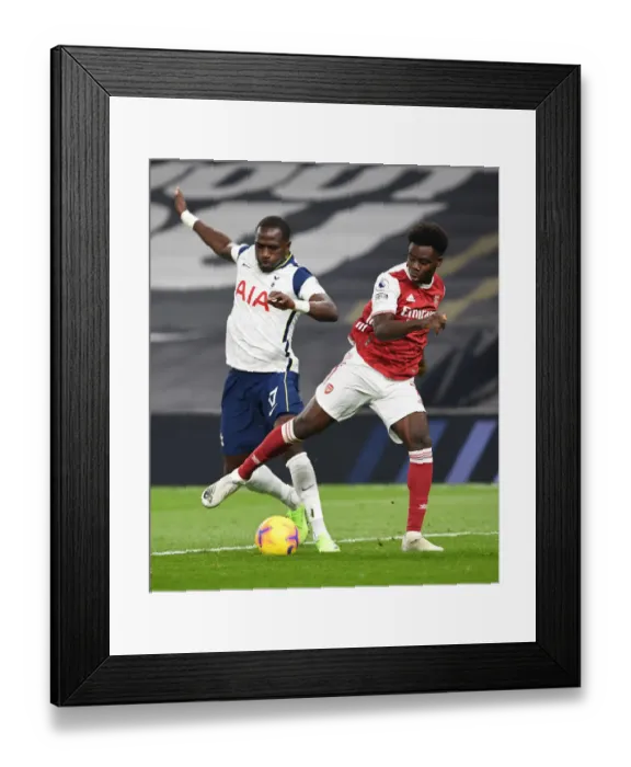 Framed Print : Saka vs. Sissoko: Battle in the Premier League - Arsenal vs. Tottenham (December 2020)
