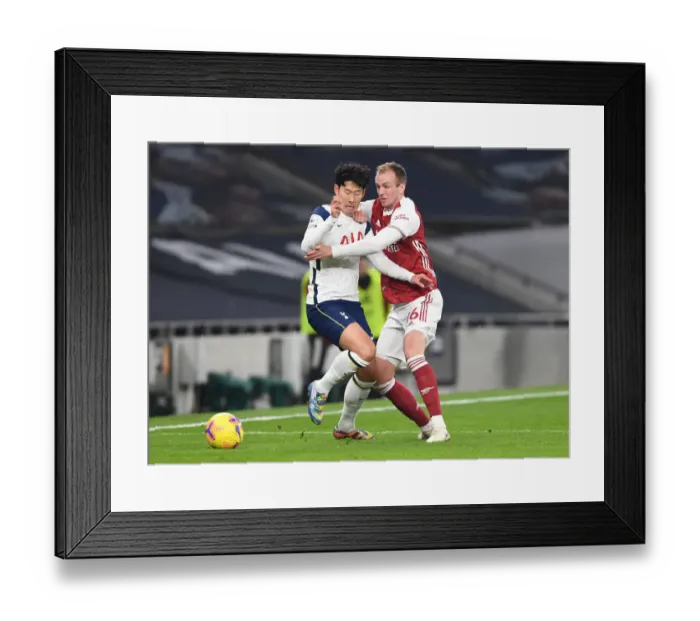 Framed Print : Tottenham vs Arsenal: Rob Holding Faces Off Against Son Heung-Min in Premier League Clash, London, 2020 Framed Print : Tottenham vs Arsenal: Rob Holding Faces Off Against Son Heung-Min in Premier League Clash, London, 2020