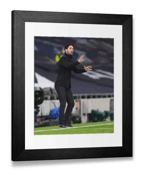 Framed Print : Mikel Arteta Leads Arsenal's Return to Action Against Tottenham Hotspur with Limited Fans in Premier League Framed Print : Mikel Arteta Leads Arsenal's Return to Action Against Tottenham Hotspur with Limited Fans in Premier League